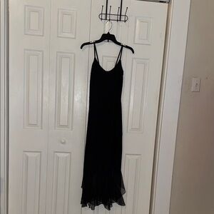 SteppinOut Sleek Black Spaghetti-Strap Maxi Dress with Ruffled Hem